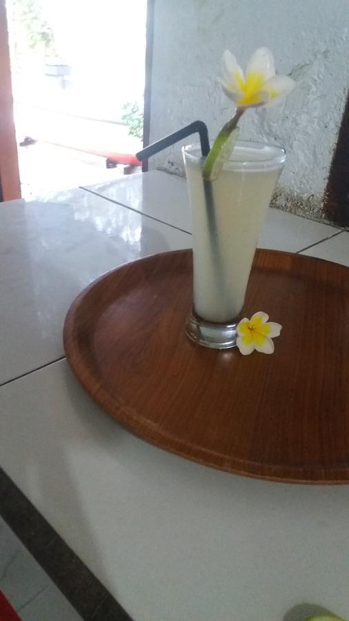 Coconut Beach Bungalows & Warung Amed Екстериор снимка